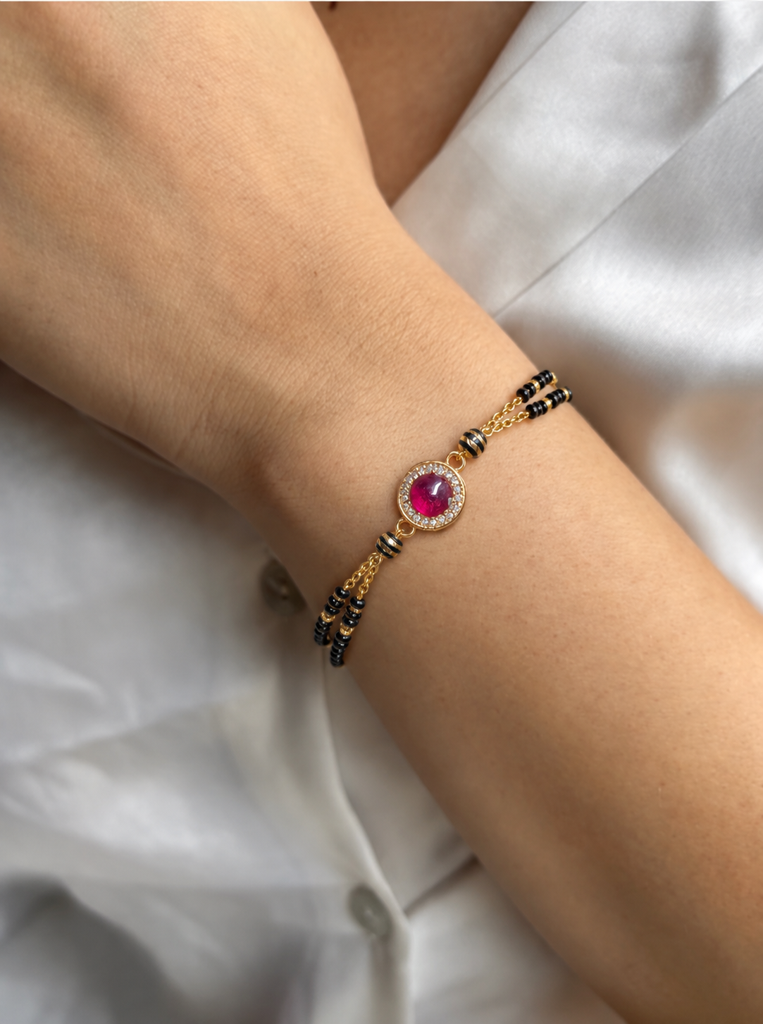 Gold-Plated Pink Stone American Diamond Mangalsutra Bracelet